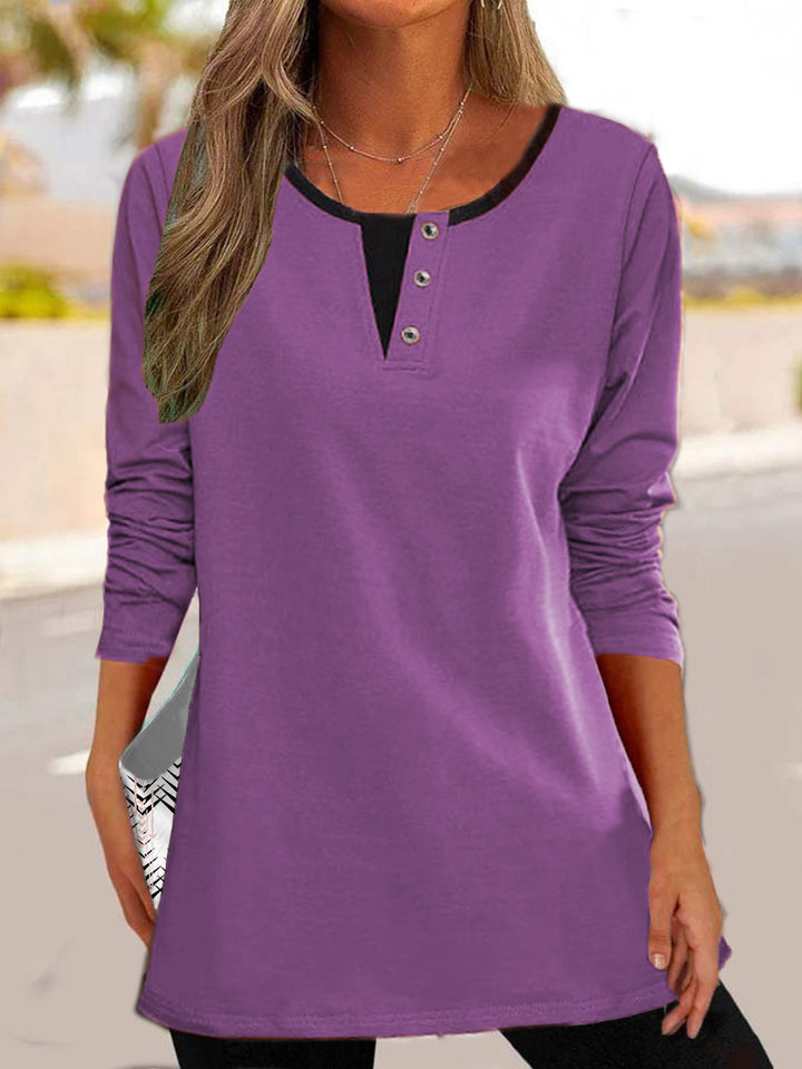 Long sleeve women's t-shirt with covered button neckline and modern side pockets Lune London