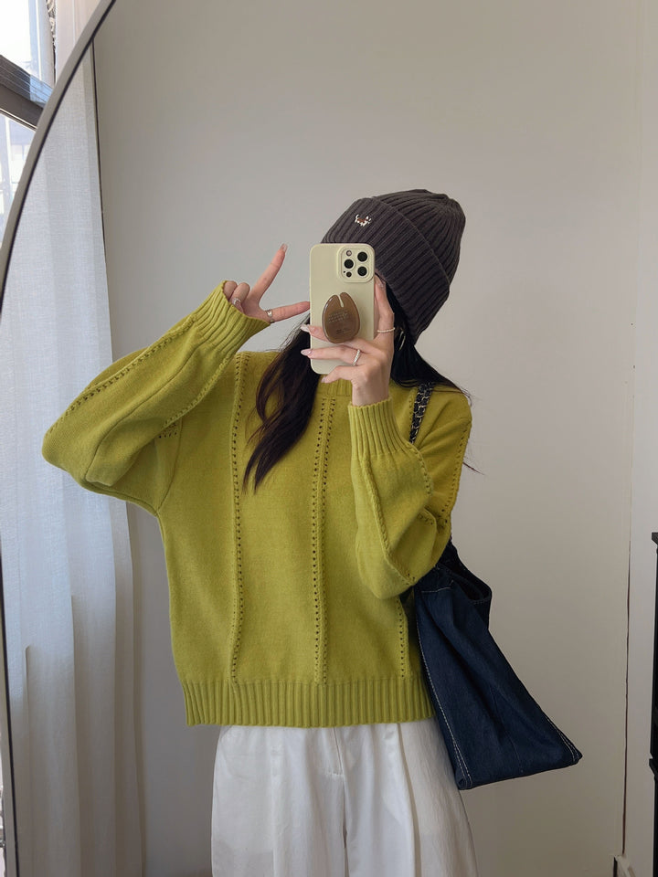 Pull en maille épaisse pour femmes avec une silhouette féminine et un design texturé Chic & Stil