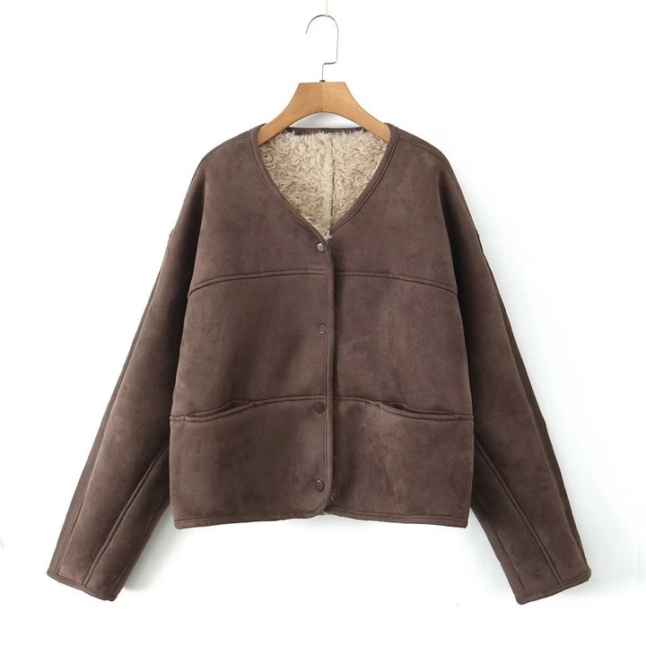 Ladies Fuzzy Short Jacket with a unique structure and a casual chic fit