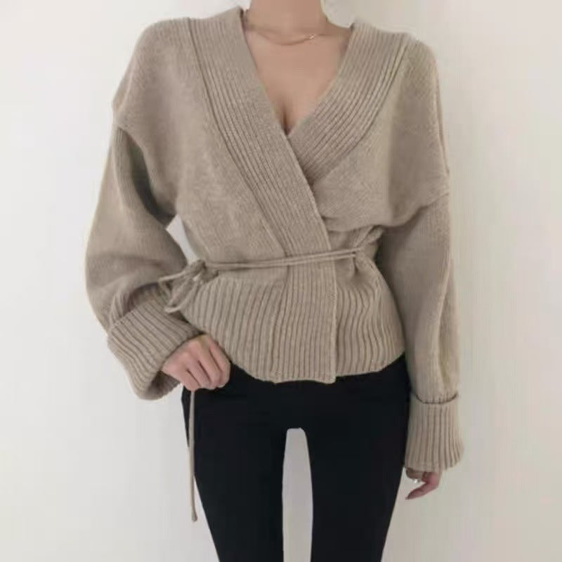 Women’s wrap knit jacket with structured design and wide sleeves Lune London