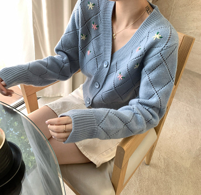 Ladies playful cardigan with diamond floral pattern and button detail Lune London