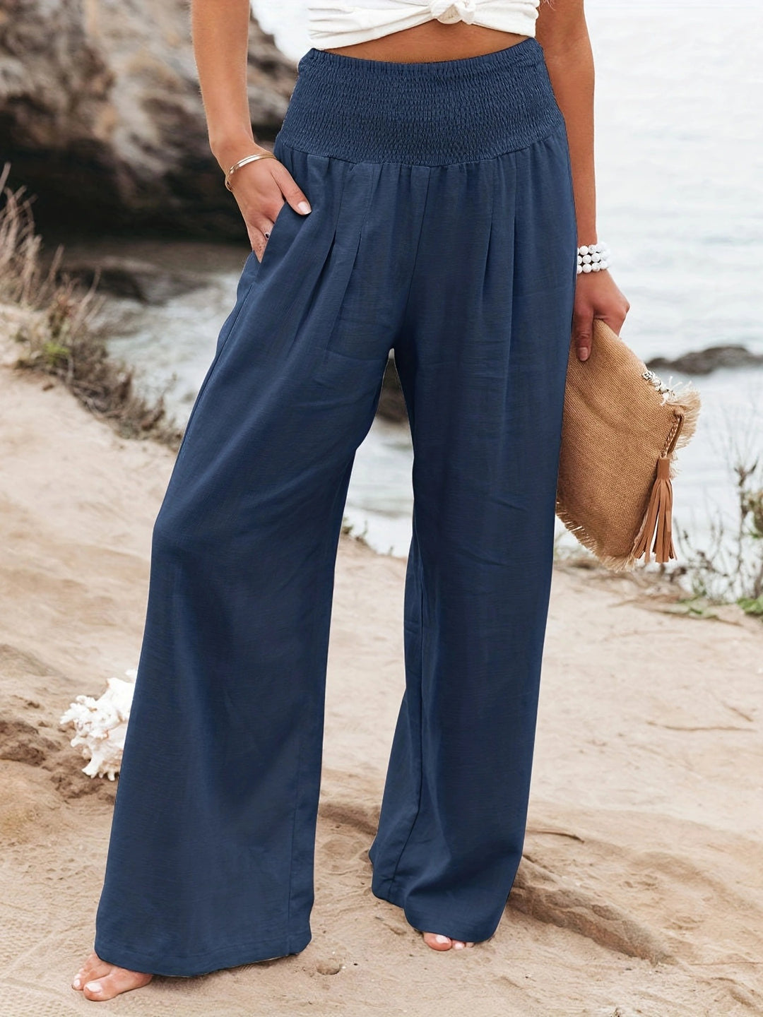 Loose summer pants for women with elastic waist and elegant draping Lune London
