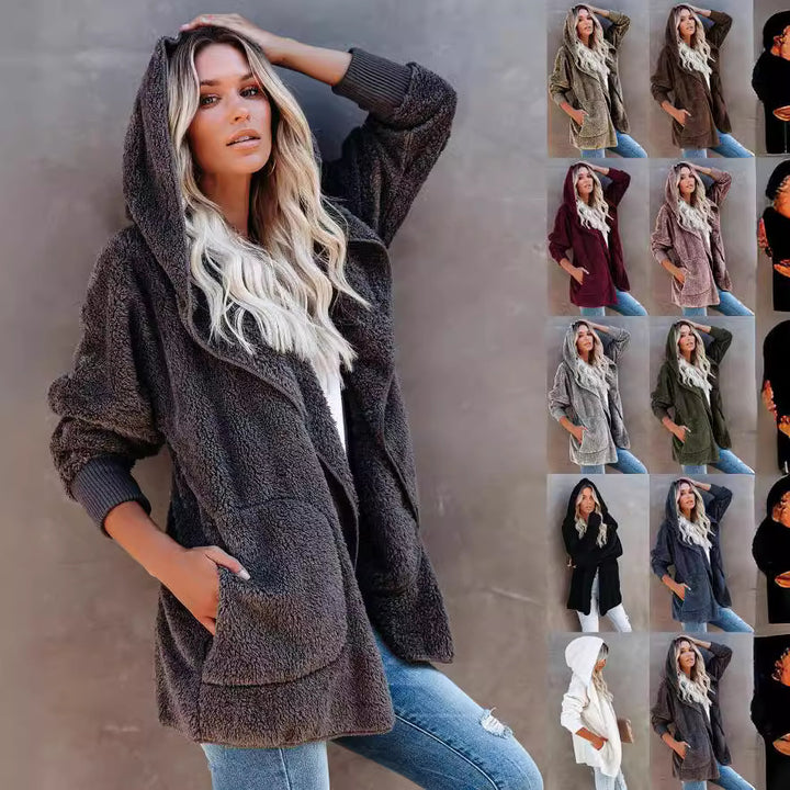 Ladies cozy fleece jacket with wide sleeves and a hood Lune London