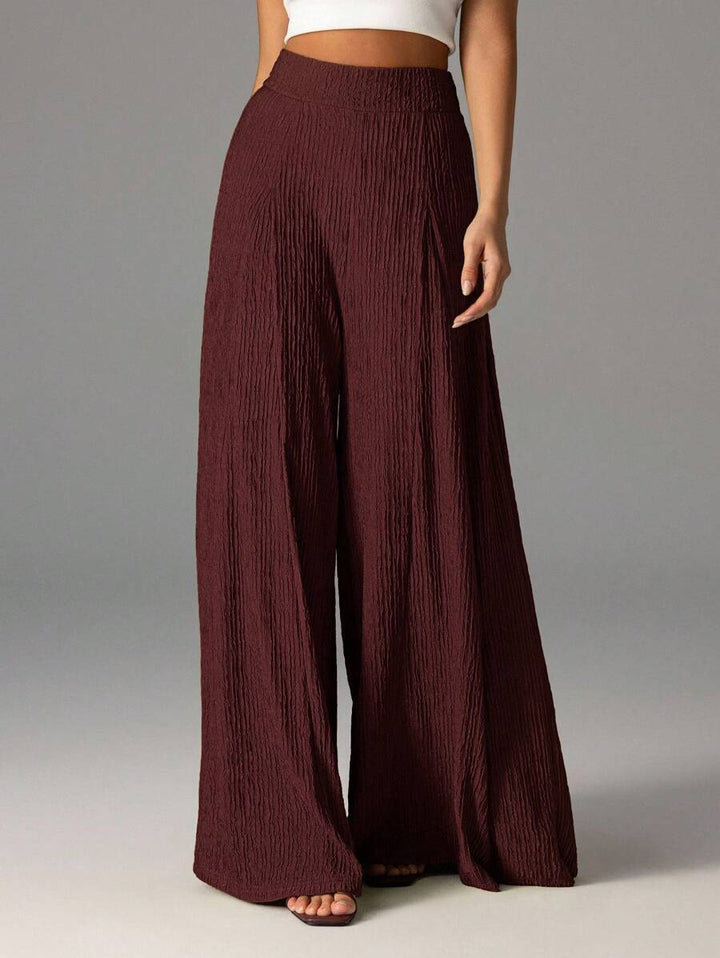 Wide pleated pants for women with high waist and elastic waistband Lune London