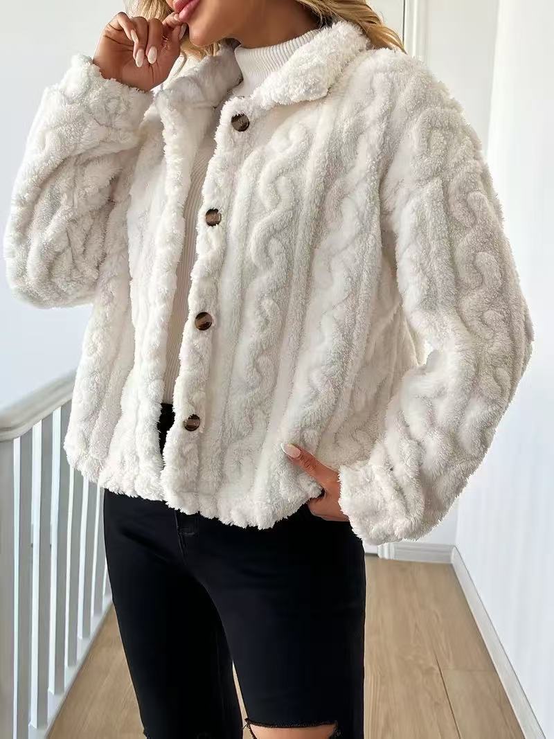 Women’s plush jacket with button closure and striped design.