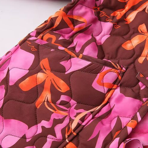 Veste matelassée légère pour femmes avec motif de nœud coloré Chic & Stil
