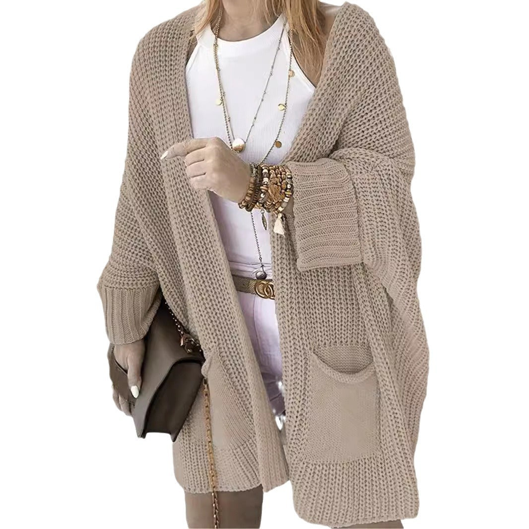 Thick knit vests for women with open sleeves and practical pockets