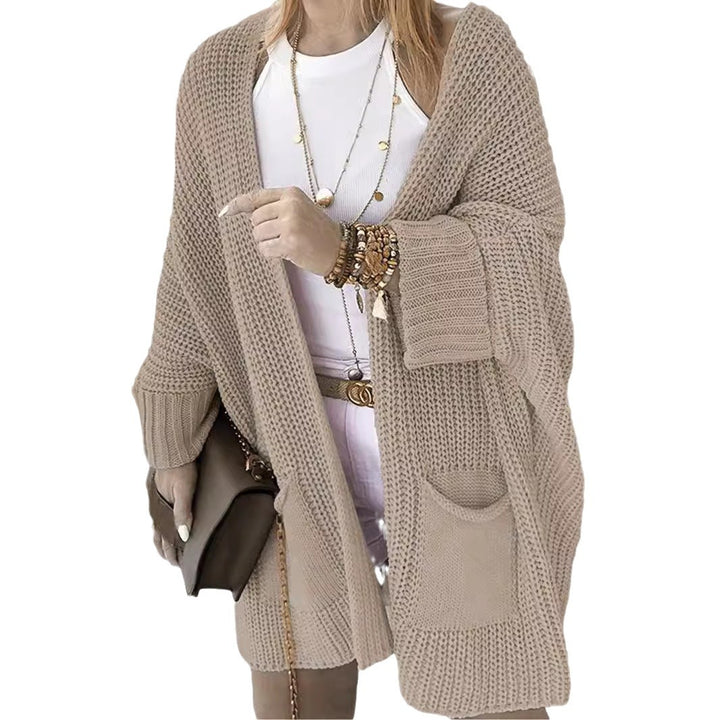 Thick knit vests for women with open sleeves and practical pockets