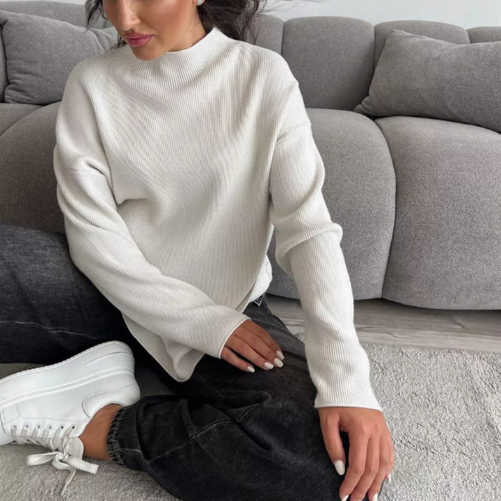 Ladies modern knit top with high collar and fine ribbed pattern Lune London