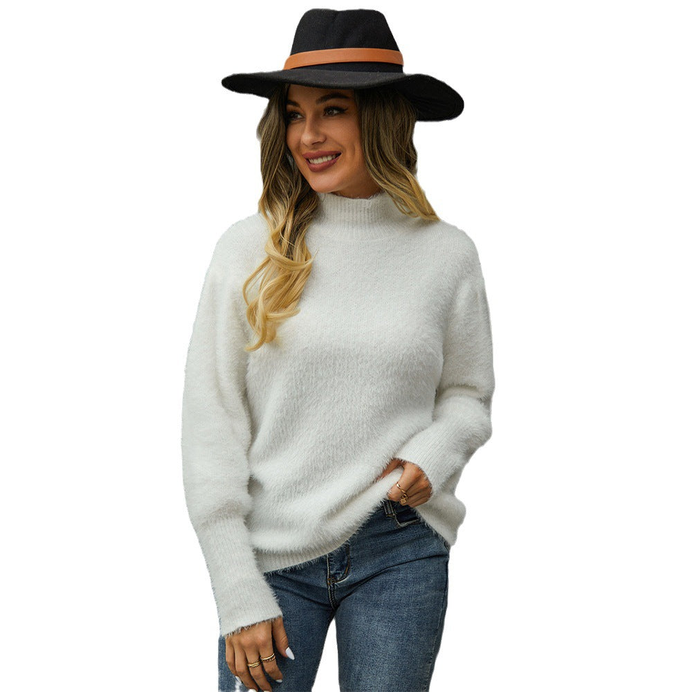 Pull confortable à col montant pour femmes avec des manches volumineuses Chic & Stil