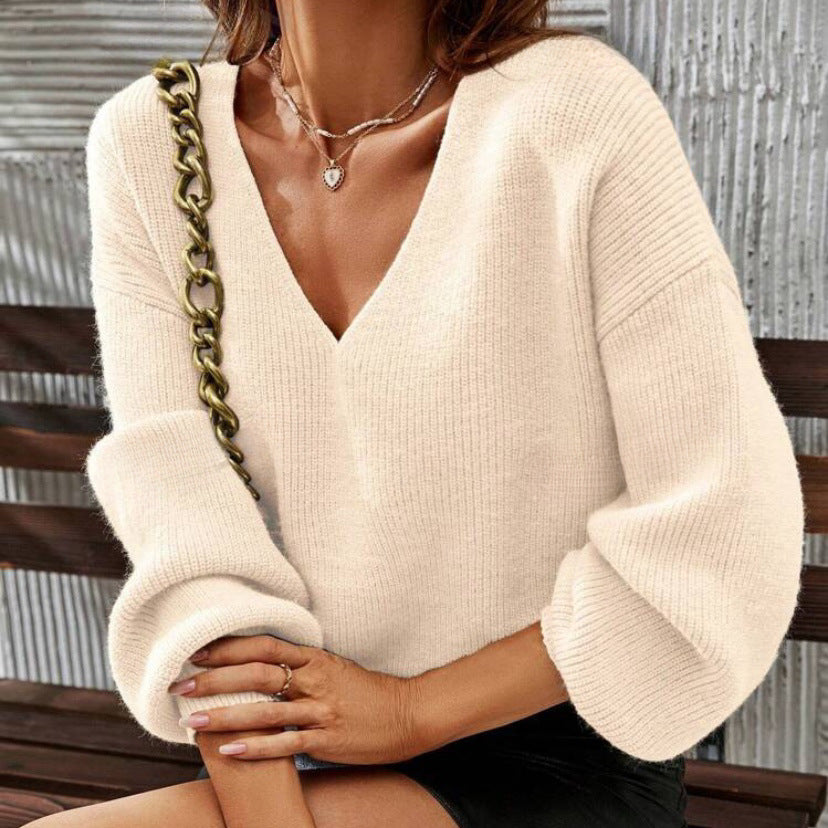Pull femme à col en V avec une coupe décontractée et des manches ballon à la mode Chic & Stil