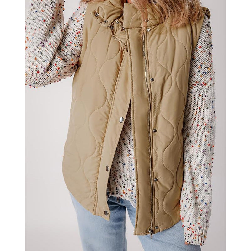 Quilted vest for women with high collar and practical pockets Lune London