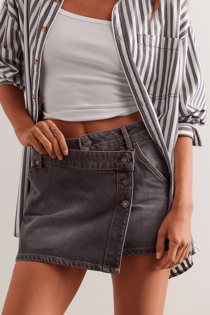 Women's fashionable A-line denim skirt with asymmetric button design and practical pockets Lune London
