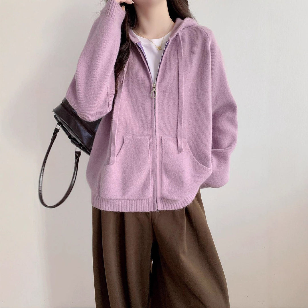 Veste à capuche pour femmes surdimensionnée avec une coupe courte et des poches pratiques Chic & Stil