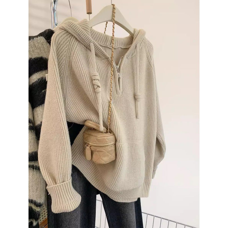 Ladies oversized knitted sweater with hood and practical zip pockets Lune London