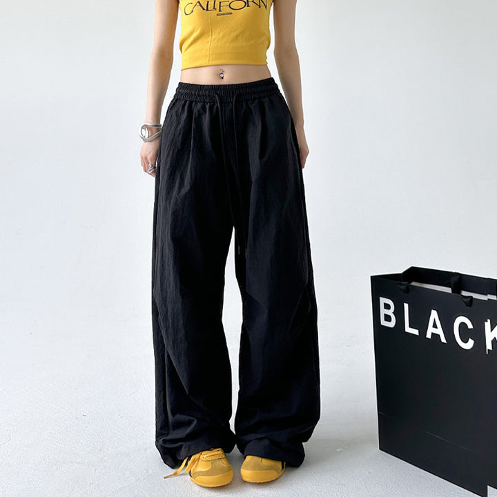 Women's Loose Sports Pants with Elastic Waistband and Drawstring Chic & Stil