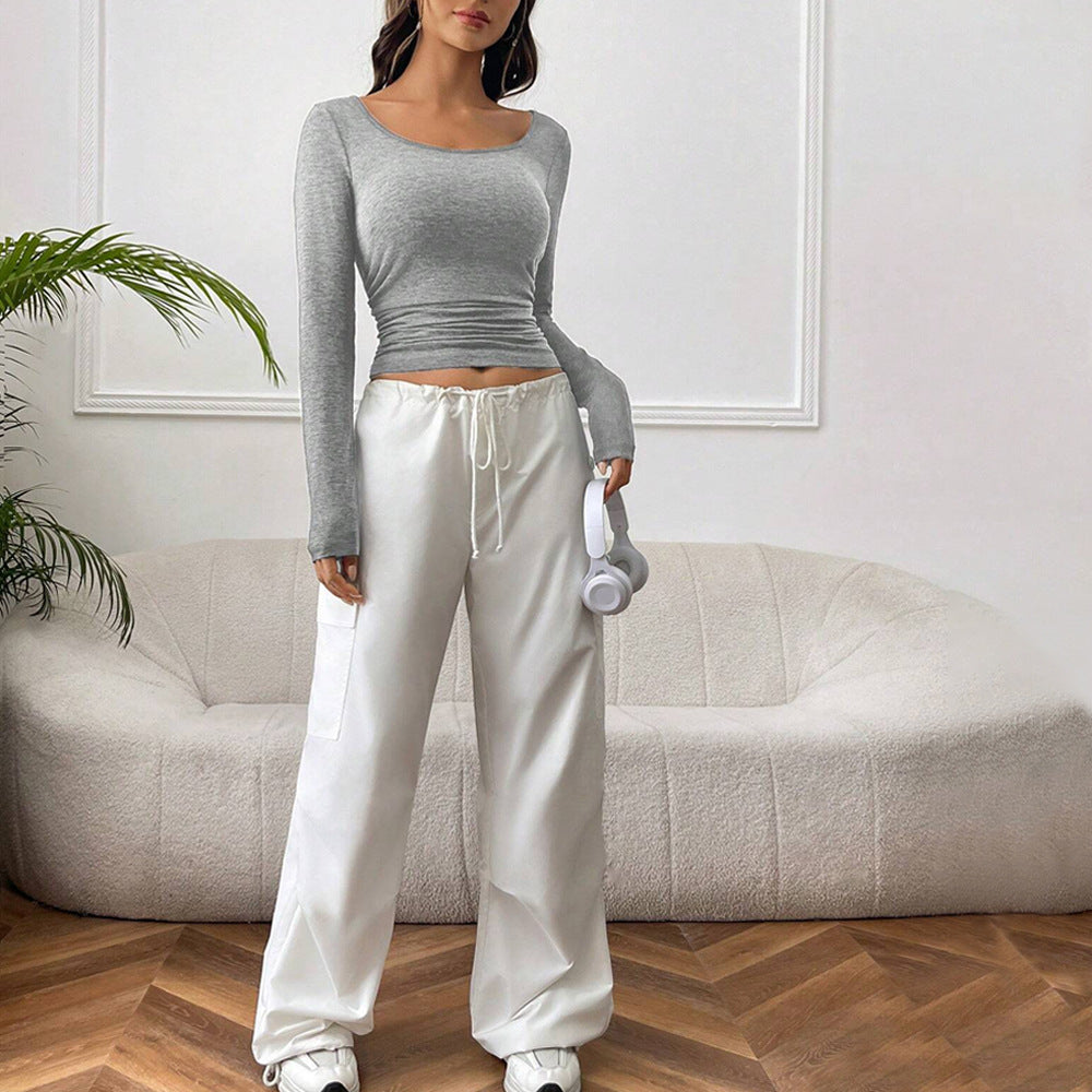 Chemise à manches longues cropped pour femmes avec une silhouette ajustée et des éléments de gathering tendance Chic & Stil