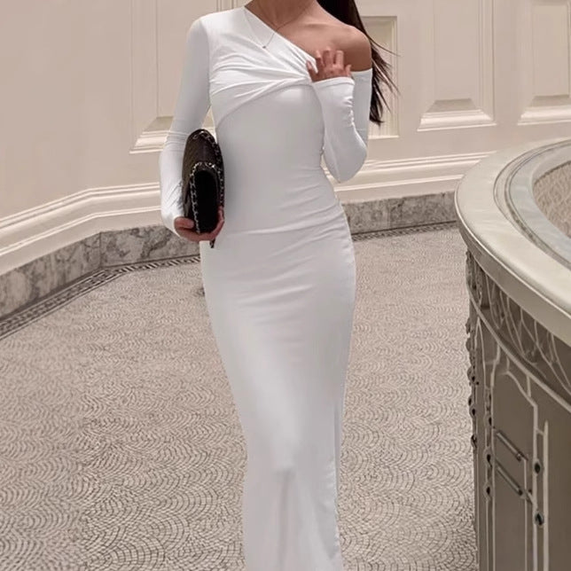 Elegant bodycon maxi dress for women with asymmetrical cut and plunging neckline Lune London