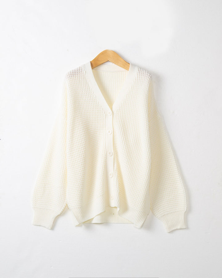 Women's knitted jacket with structured pattern and practical button details Lune London