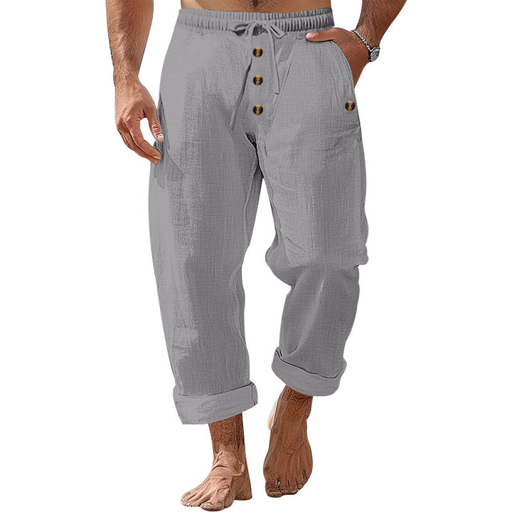 Casual beach pants for men with elastic waistband and practical button details Lune London