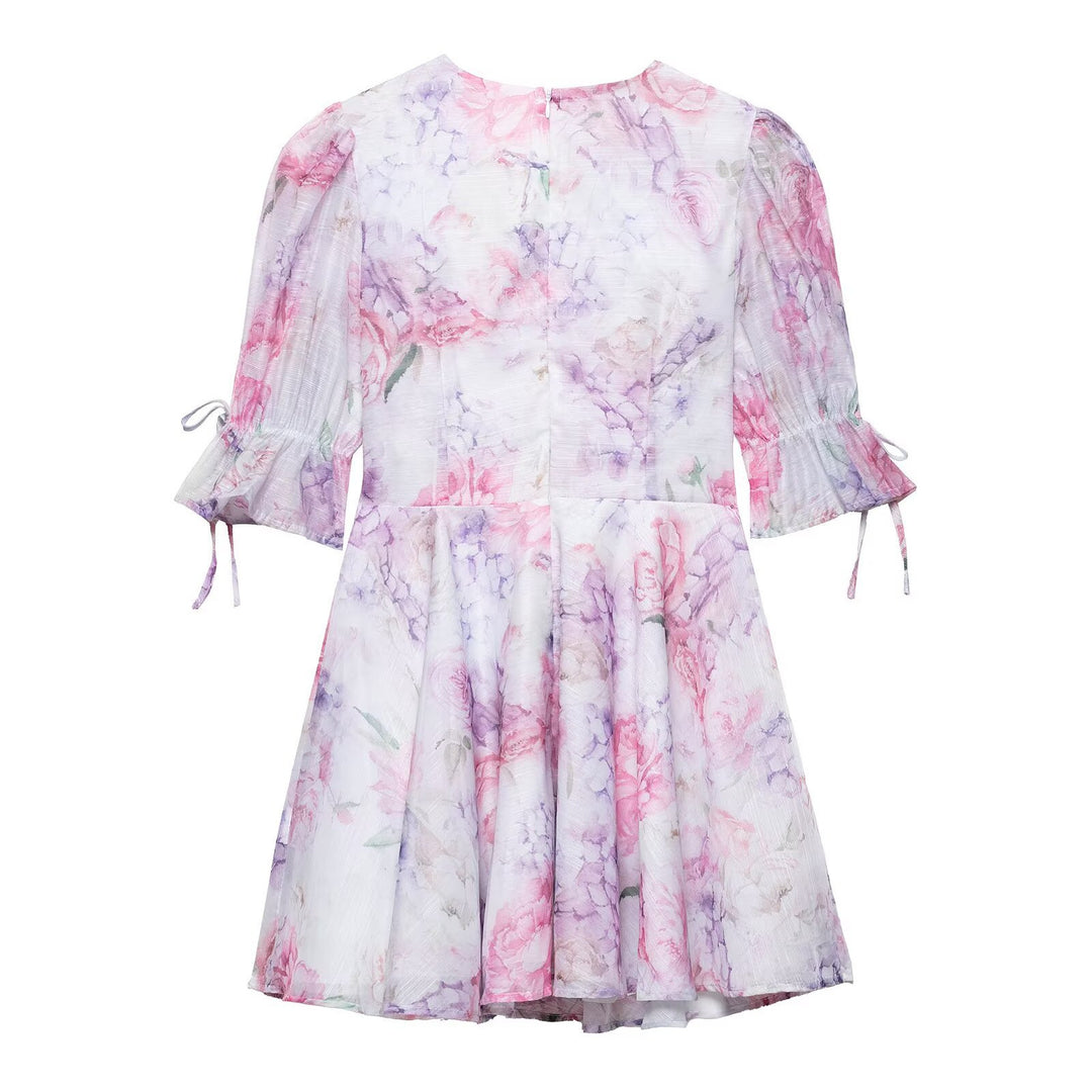 Playful summer dress for women with a chic floral 3D application design