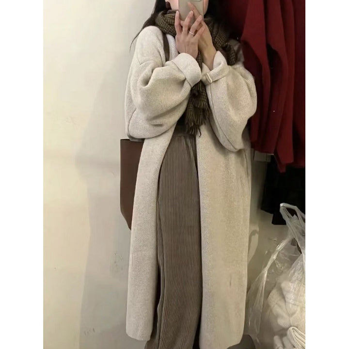 Manteau long en tricot pour femmes avec une coupe surdimensionnée et une doublure en polaire douce