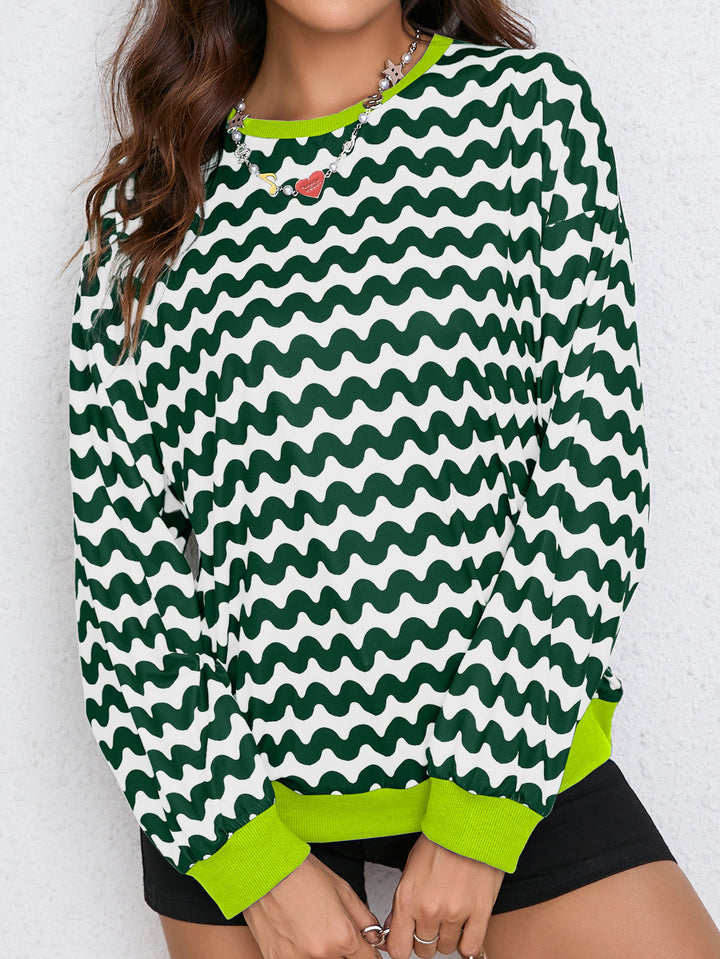 Sweat-shirt coloré pour femmes avec motif de vagues et coupe sportive Chic & Stil