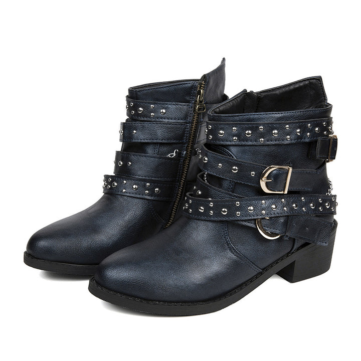 Trendy women's ankle boots with decorative straps and chain elements Lune London