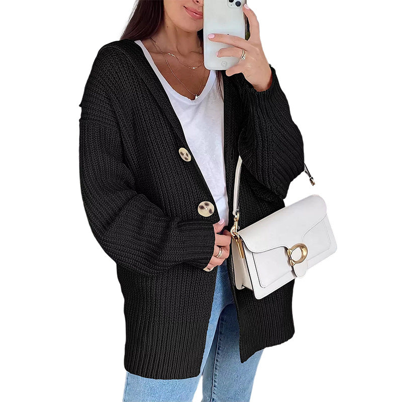 Thick knit jacket for women with an oversized fit and stylish wooden buttons Lune London