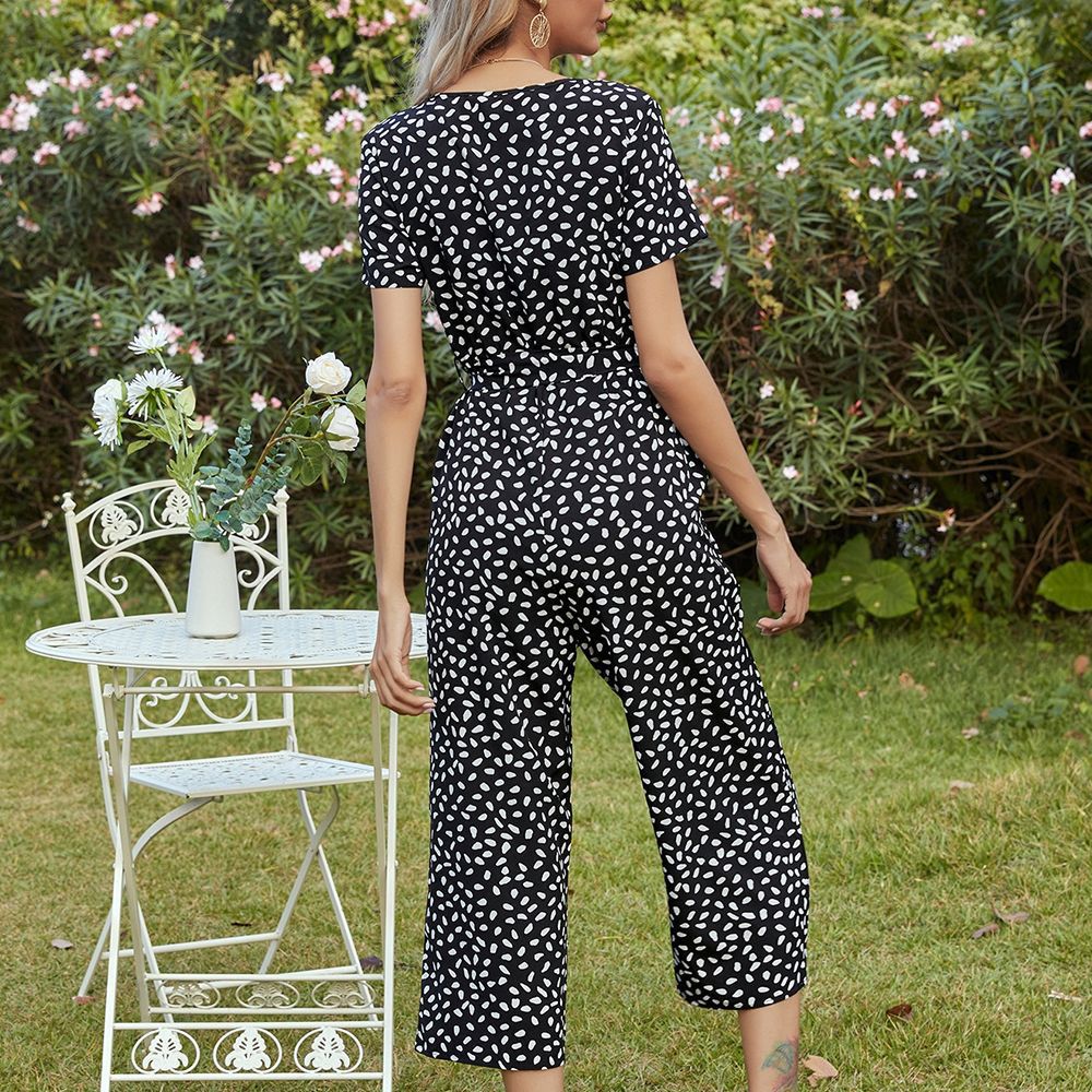 Women's jumpsuit with button neckline and waist belt Lune London