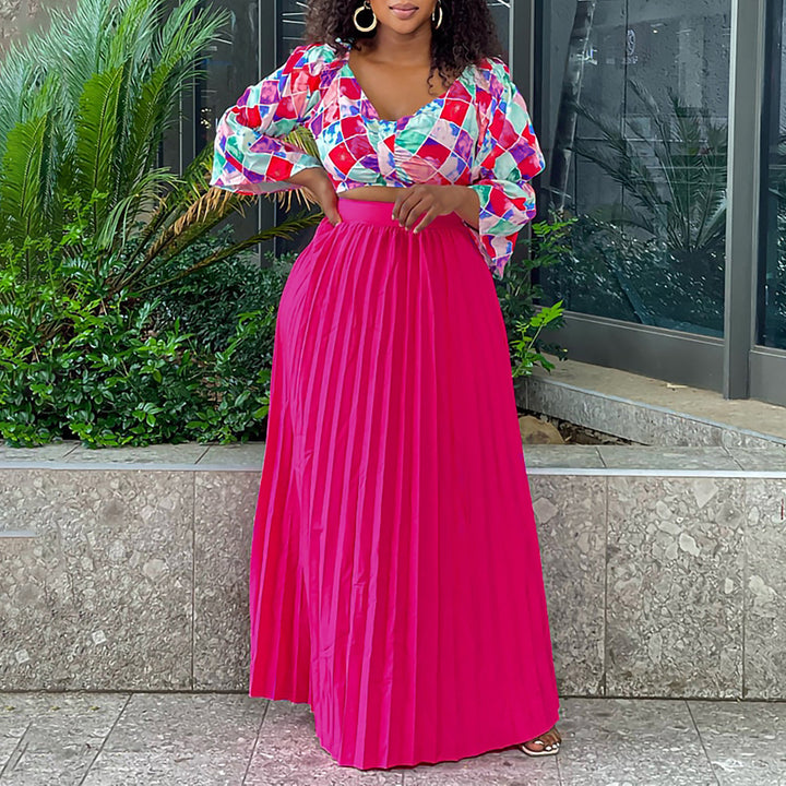Pleated combined dress for ladies with a colorful top and a flared skirt Lune London