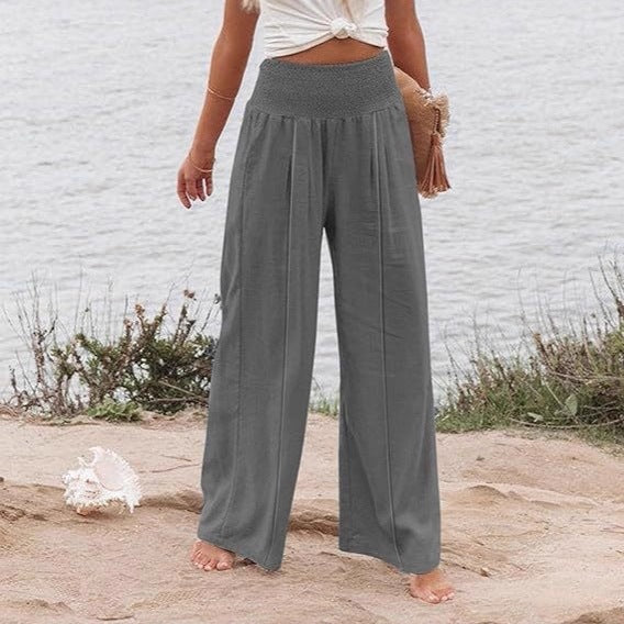 Elegant and wide Palazzo trousers for women with high waist and draping Lune London