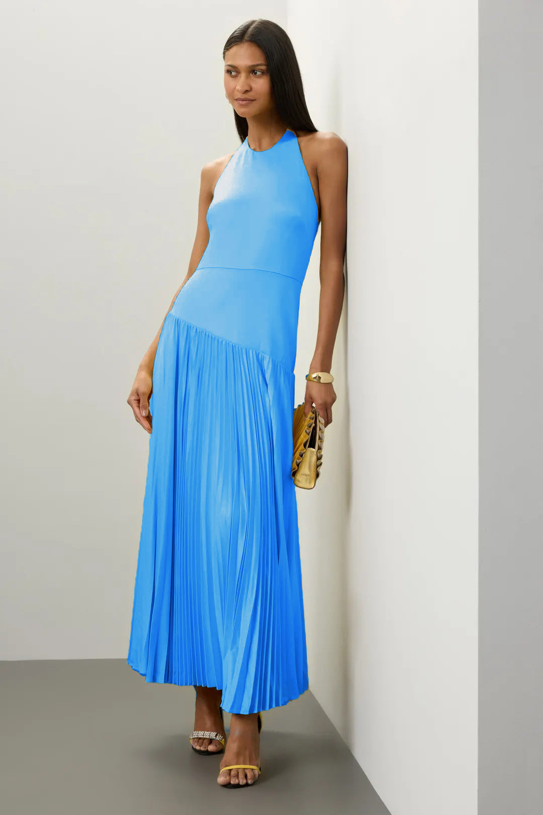 Ladies Elegant Maxi Dress with Flowing Pleated Skirt and Halter Neck Design