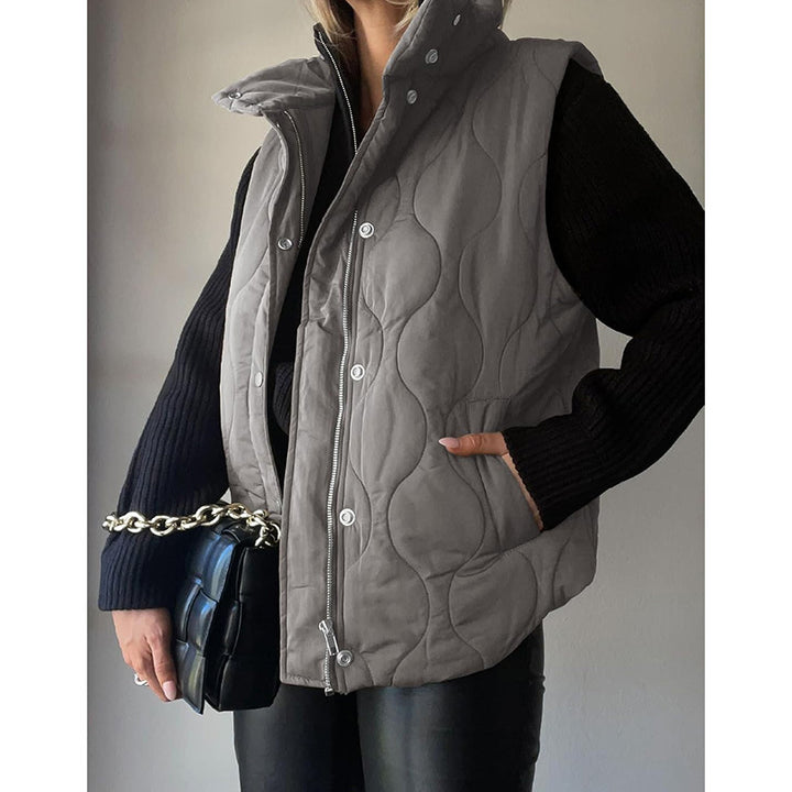 Quilted vest for women with high collar and practical pockets Lune London