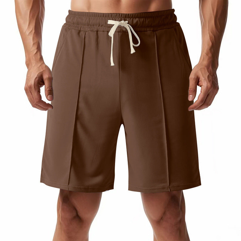 Comfortable sports shorts for men with elastic waistband and practical side pockets Lune London