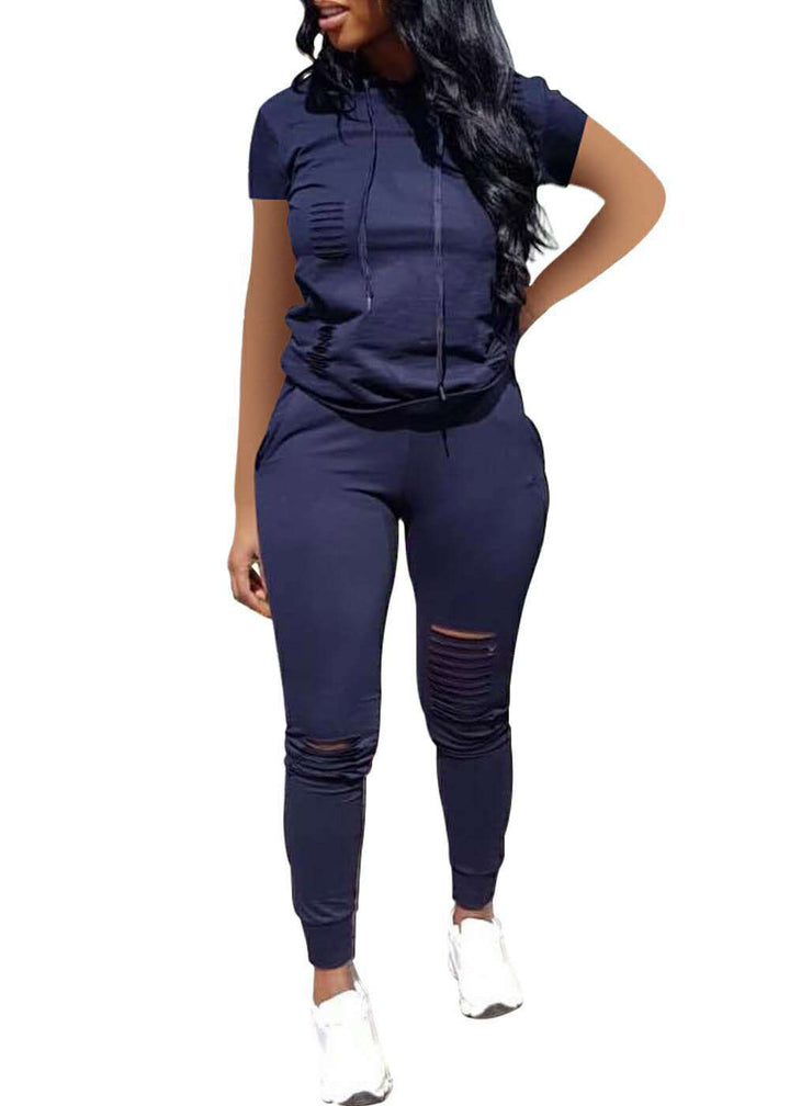 Women's jogging suit with stylish zip details and a chic sporty fit
