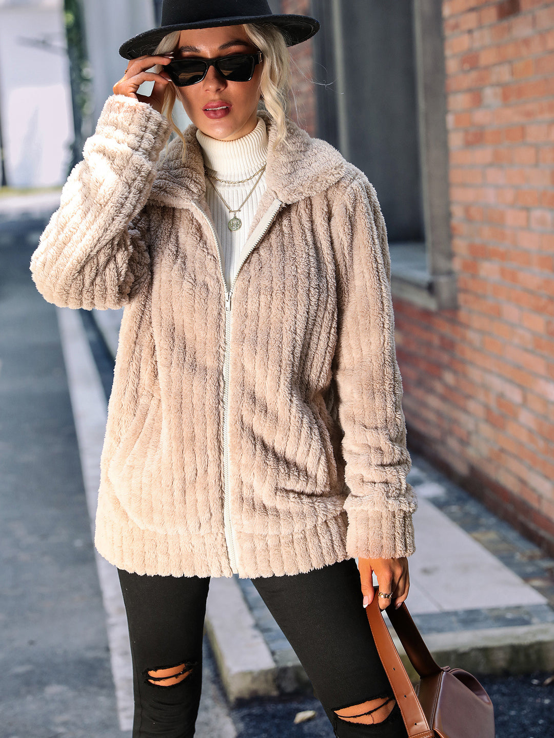 Soft fleece jacket for women with a soft collar and practical zippered pockets Lune London