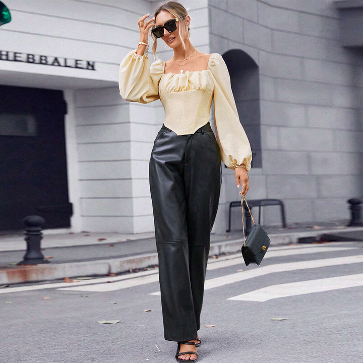 Blouse en dentelle pour femmes avec manches bouffantes et silhouette cintrée Chic & Stil