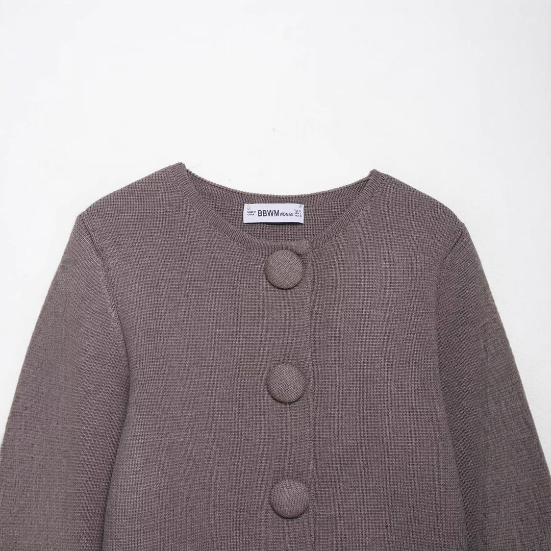 Cardigan féminin élégant avec détails de boutons Chic & Stil