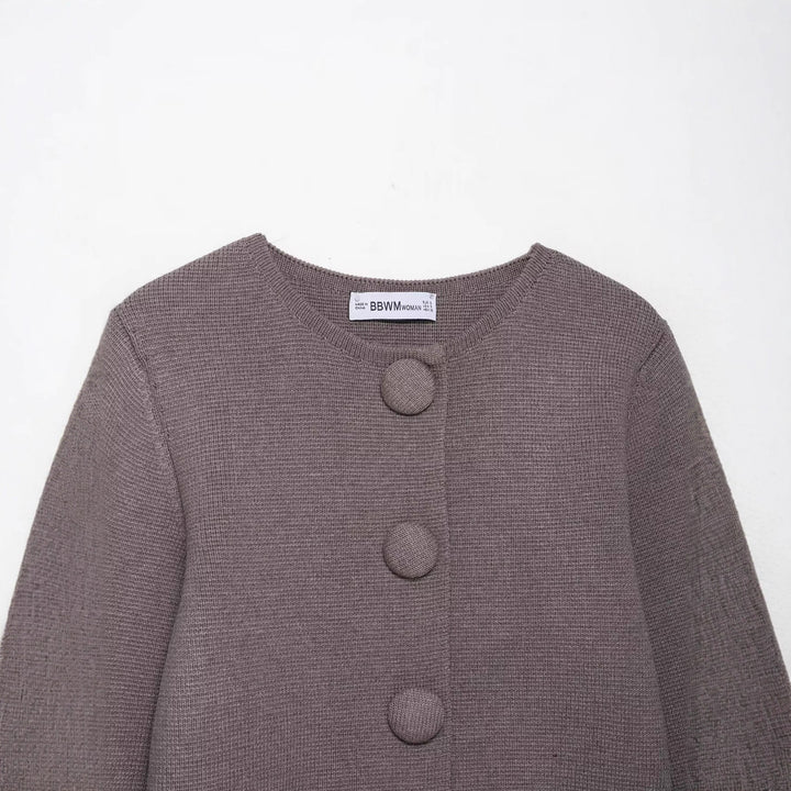 Cardigan féminin élégant avec détails de boutons Chic & Stil