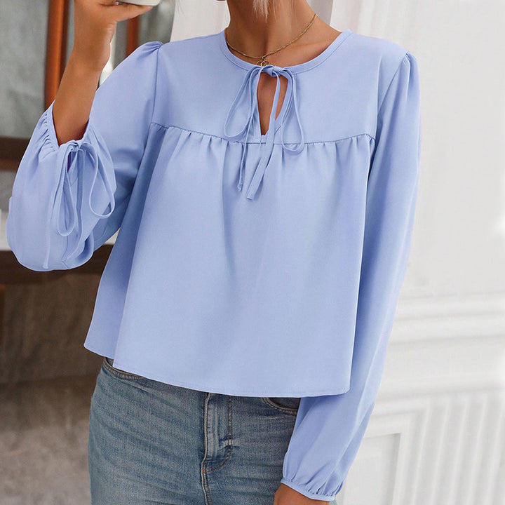 Blouse pour femmes avec lien décoratif et coupe décontractée Chic & Stil