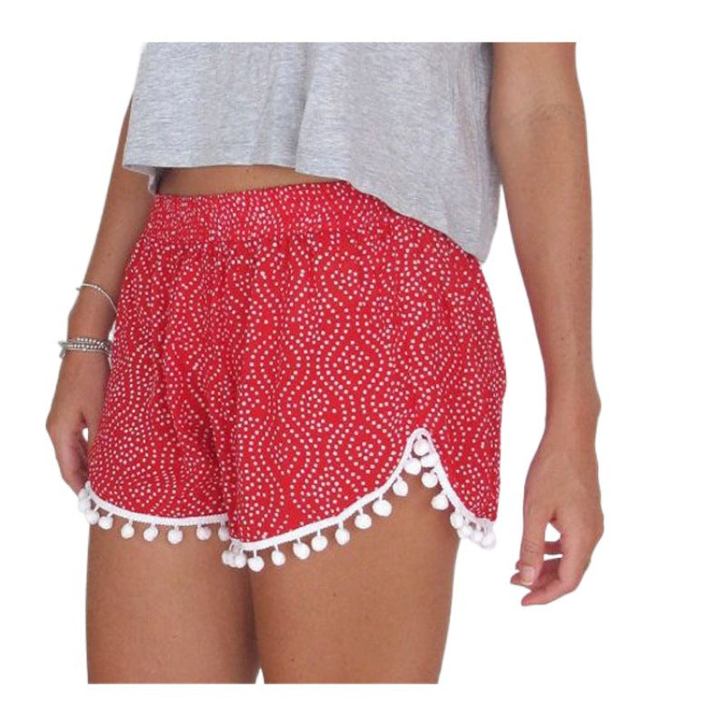 Shorts d'été pour femmes avec des détails de pompons ludiques et un motif de vagues tendance Chic & Stil