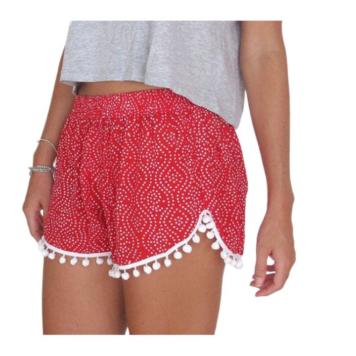 Shorts d'été pour femmes avec des détails de pompons ludiques et un motif de vagues tendance Chic & Stil