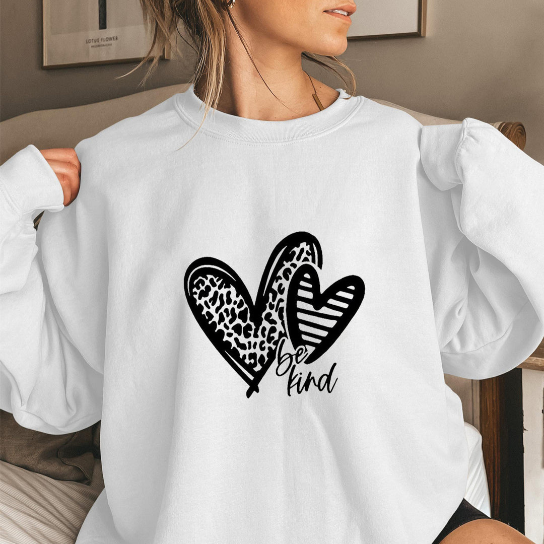 Sweat-shirt femme avec motif de cœur à la mode et coupe décontractée Chic & Stil