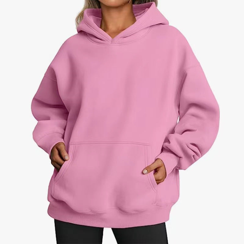 Women's oversized hoodie with practical kangaroo pockets and soft inner lining Chic & Stil