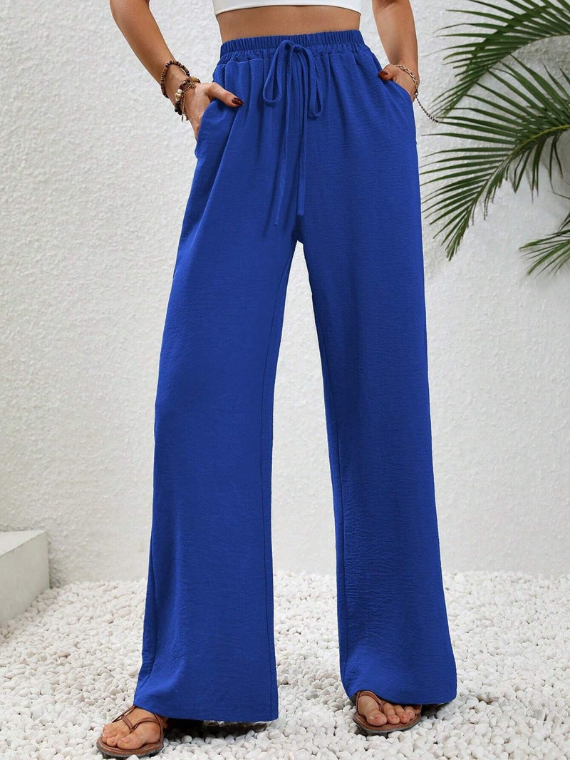 Loose-fit leisure pants for women with an elastic waistband and practical side pockets Lune London
