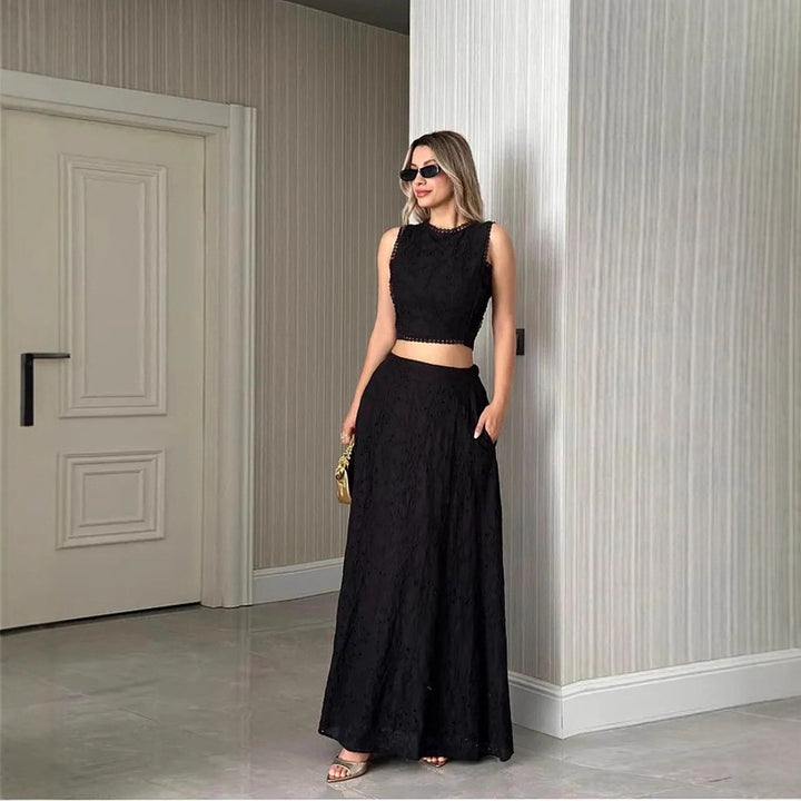 Women's maxi dress with delicate hole embroidery pattern and trendy crop top Lune London