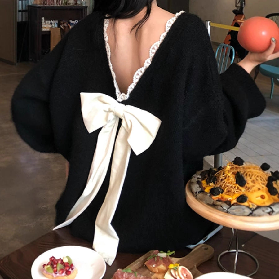 Oversized knit sweater for women with V-neck and delicate lace trim Lune London