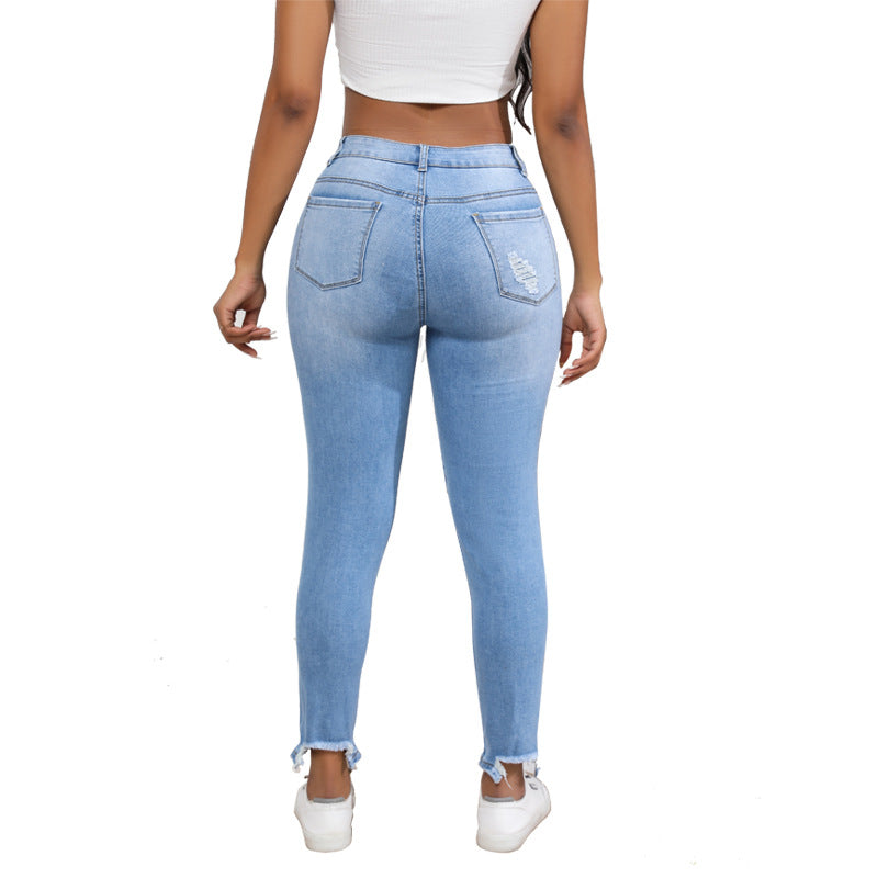 High-waisted women's jeans with ripped and fringed details Lune London