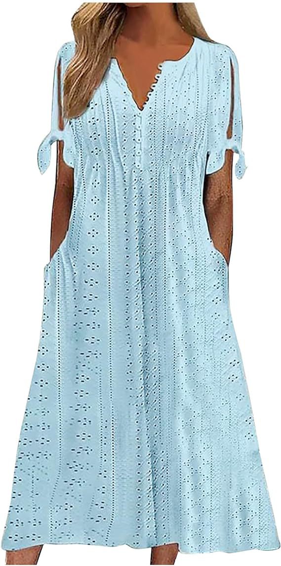 Airy midi dress for women with decorative hole patterns and practical pockets Lune London